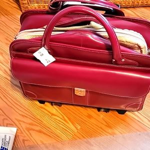 Mcklein Lakeview top grain cowhide leather. Removable from the wheels.